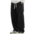 Pantalones de hombre de corte holgado, con cordón y bolsillos